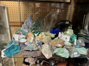 Mineral specimens and geodes on a shelf
